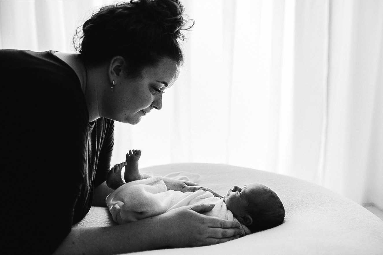 Yasmin Anne in her business with a newborn